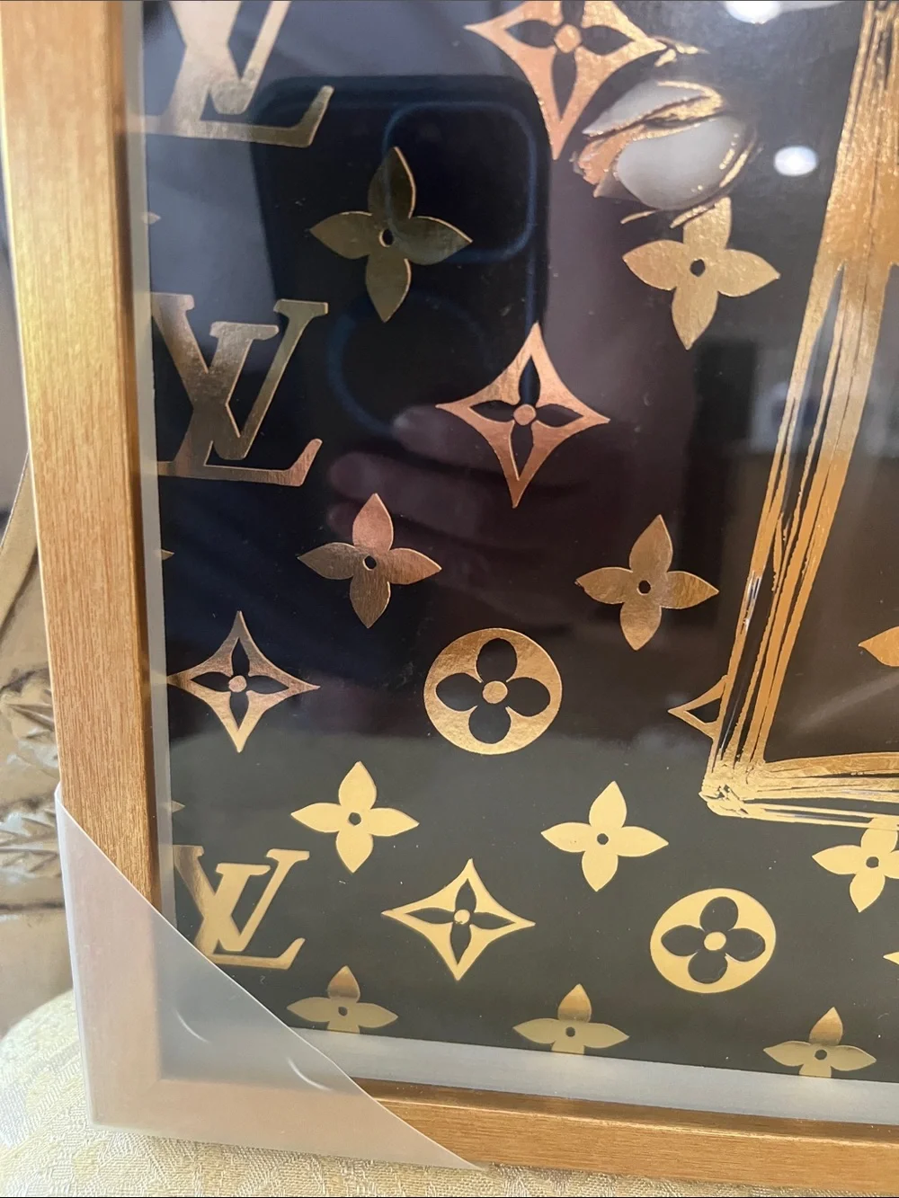 CHANEL Black and Gold Eau Première Framed Wall Art with White Floral Accents